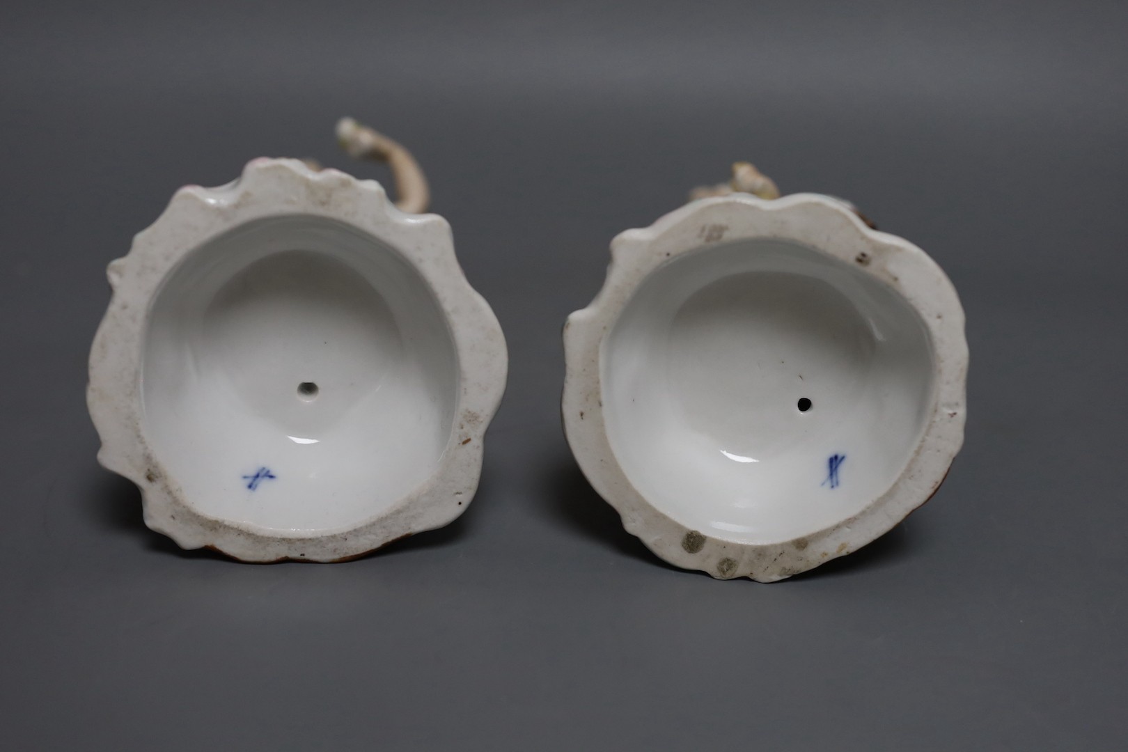 A pair of 19th-century Sitzendorf porcelain candlestick figures